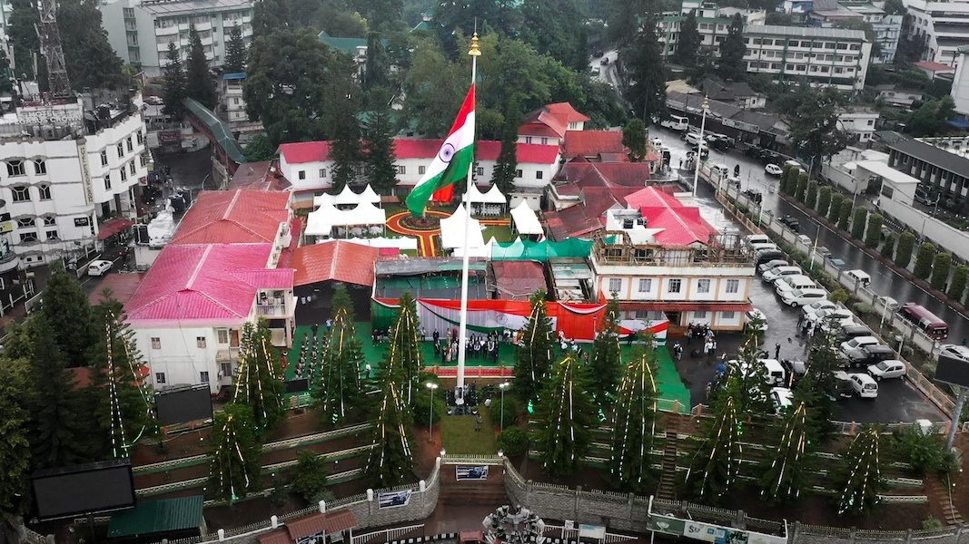 National flag flying from a high mast flag pole at the Meghalaya Legislative Assembly