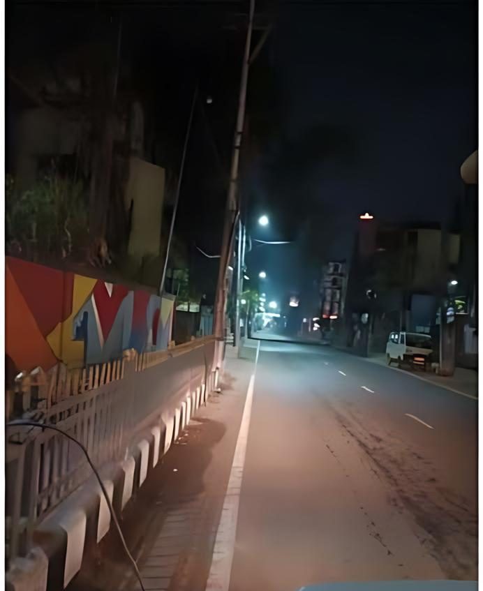 Street lighting installed along a Guwahati road at night